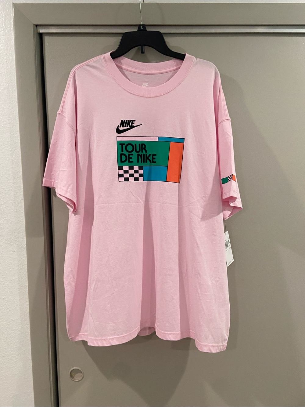 Nike Pink 'Tour de Nike' Graphic Tee with Teal & Orange Panel